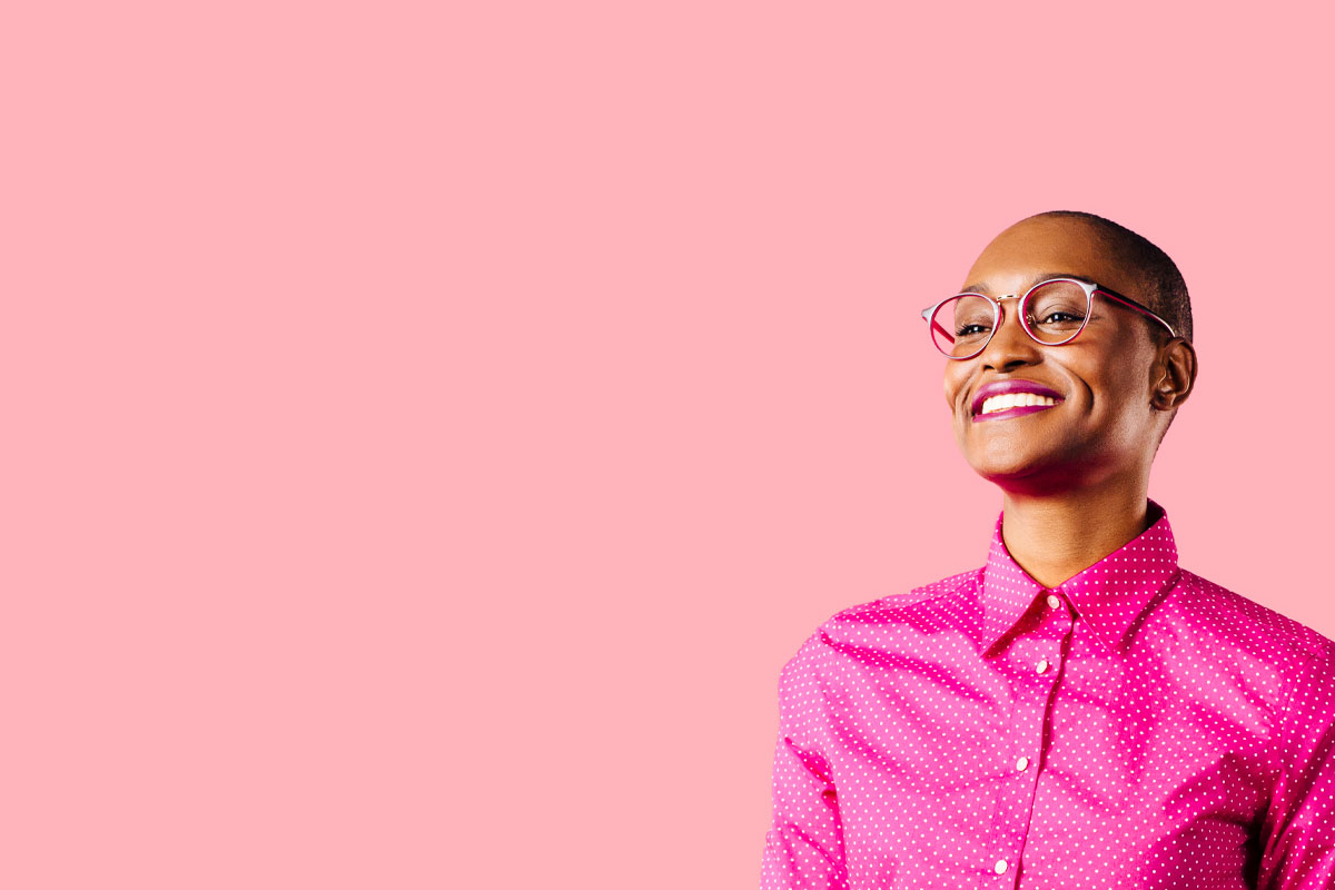 StarterStudio Hero Image > Woman smiling over pink background